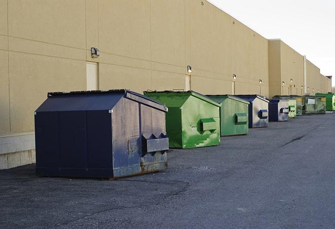 metallic dumpster units staged for construction garbage in Broadview Heights